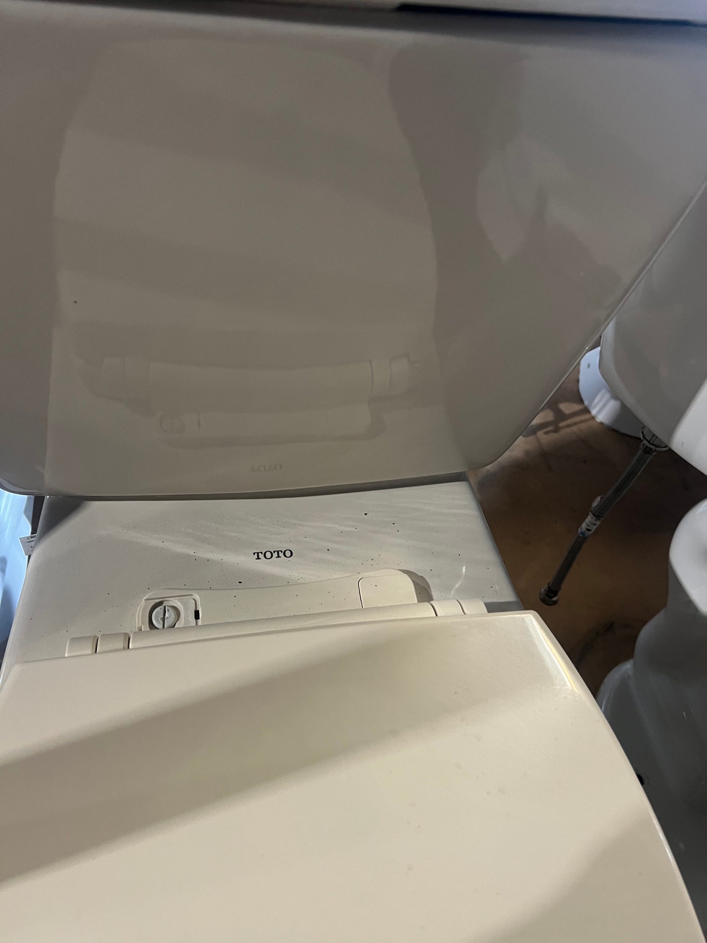 TOTO brand toilet tank detail