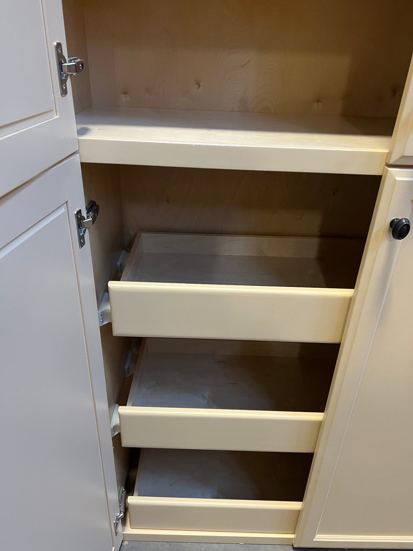 Pantry cabinet interior pull-out shelves
