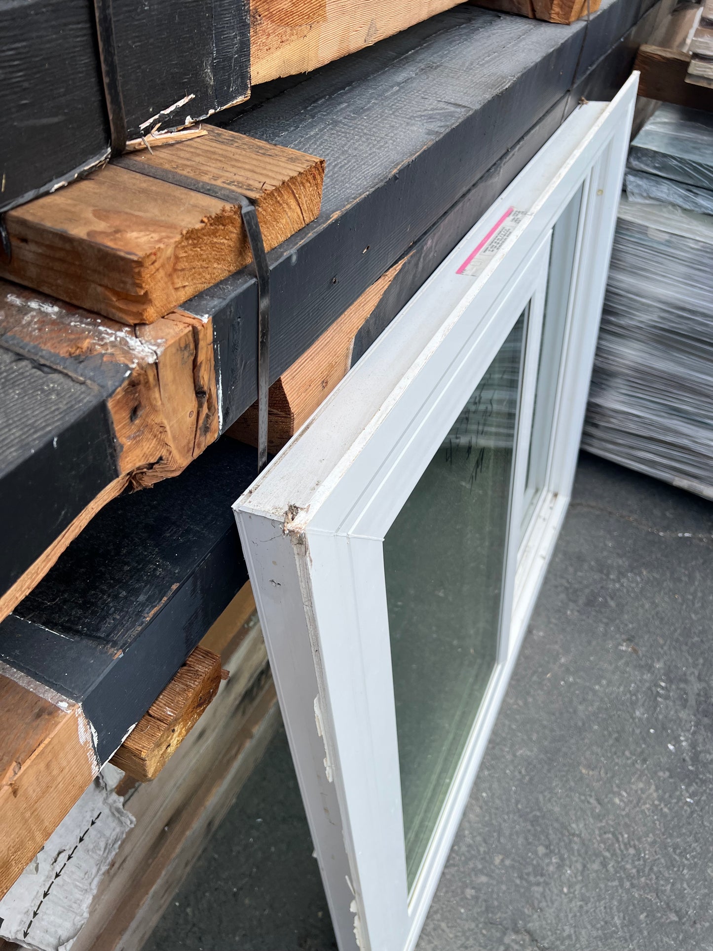 White vinyl sliding window frame detail