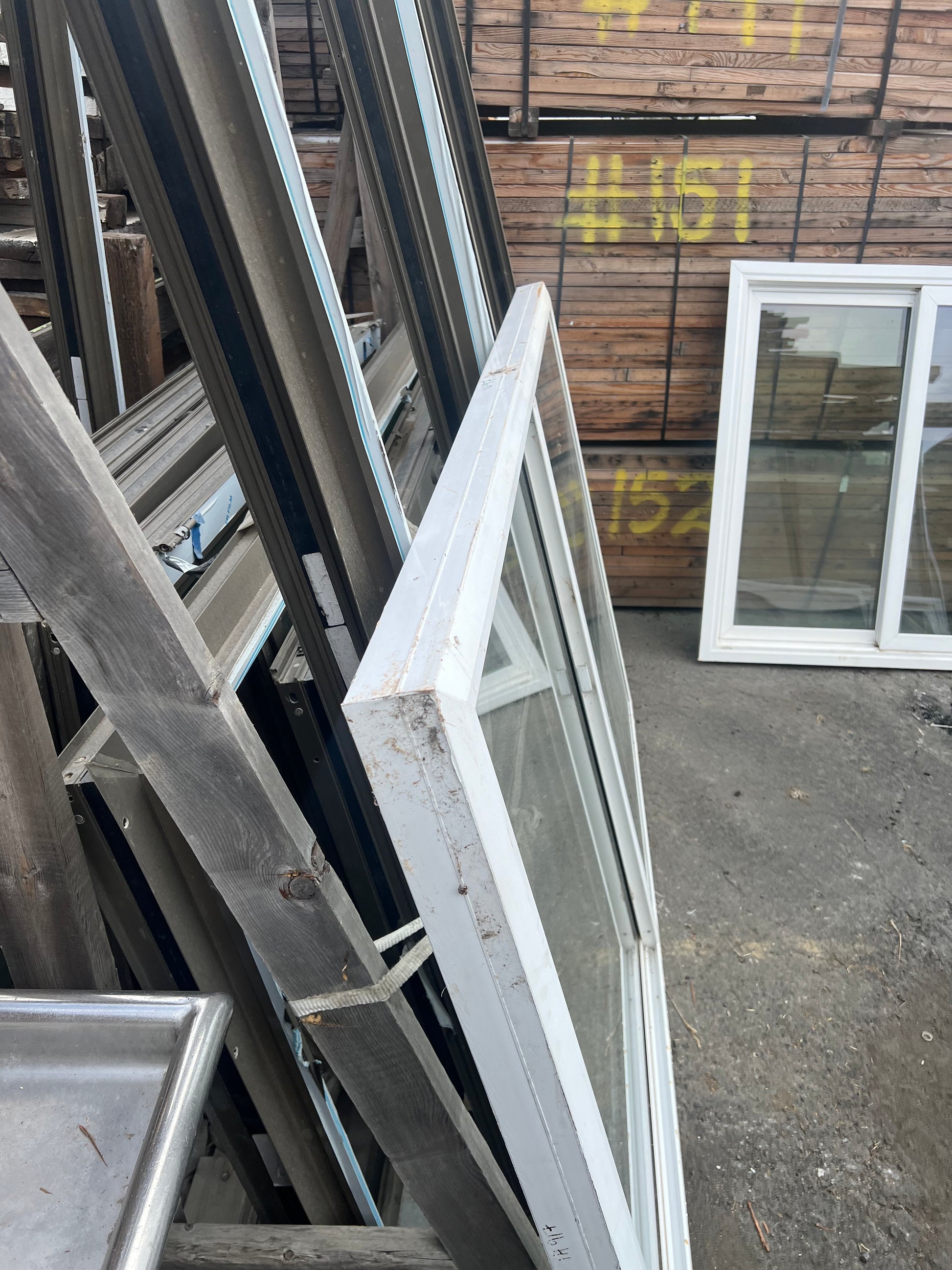 White vinyl sliding window 80x51.5 dimensions on frame
