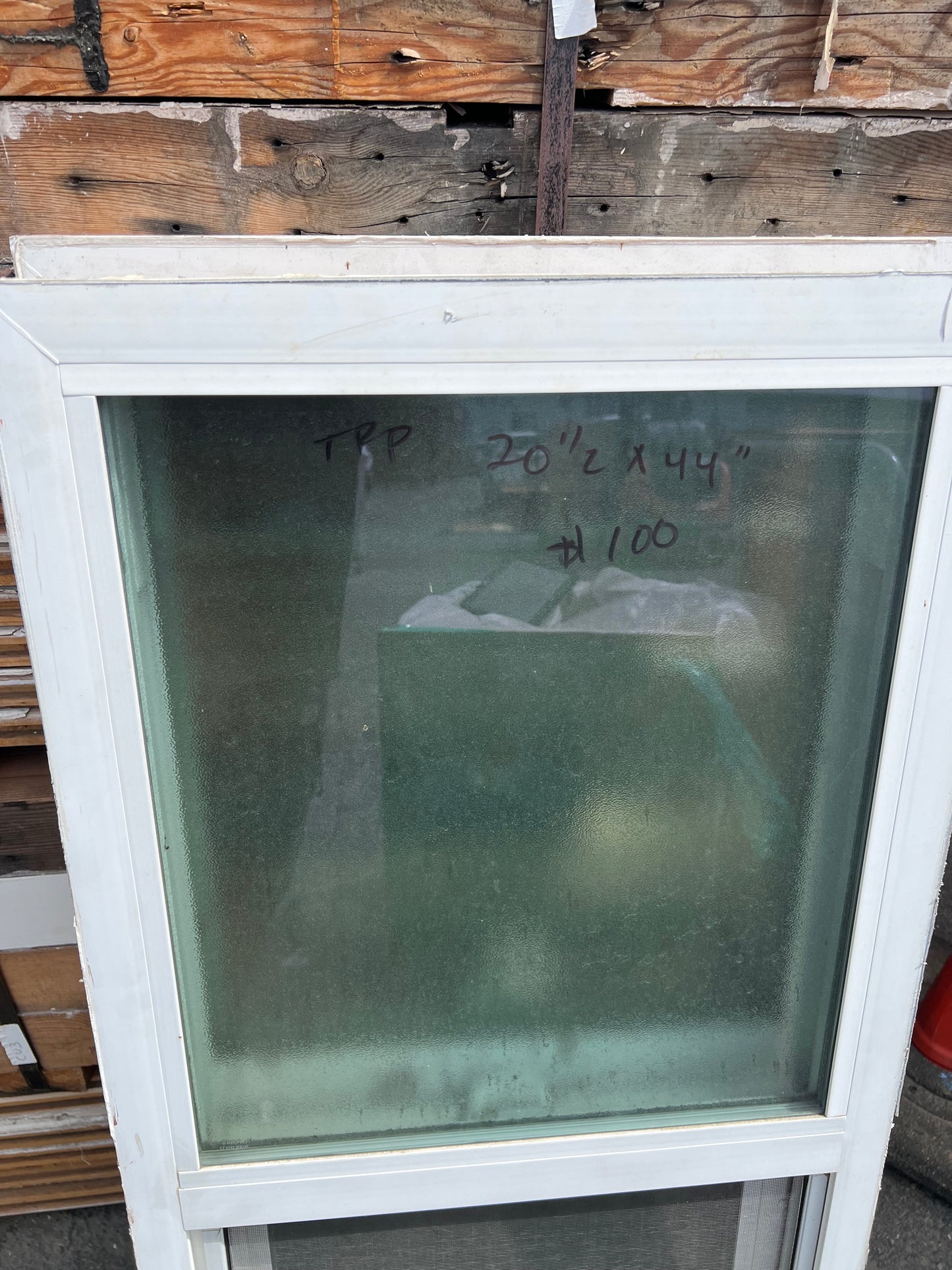 White hung window frosted glass and screen