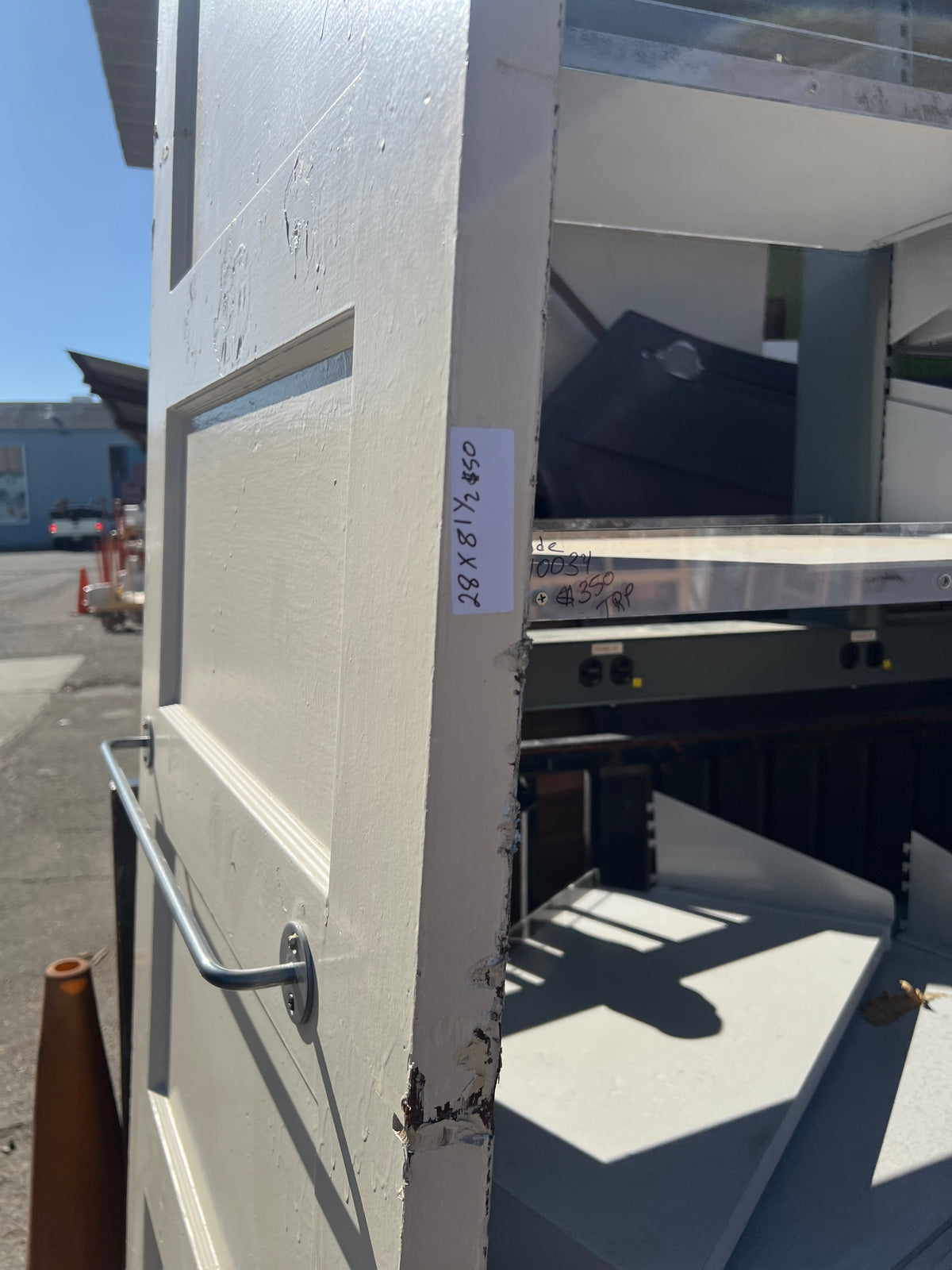 Cream interior door with bar 28x81.5 | The ReUse People Oakland