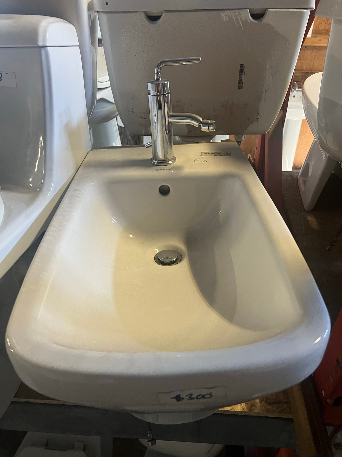 Duravit brand mark on bidet, BX4 | The ReUse People Oakland