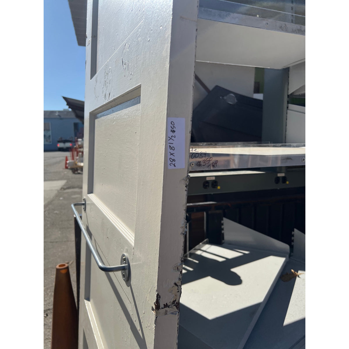 Cream interior door with bar 28x81.5 | The ReUse People Oakland