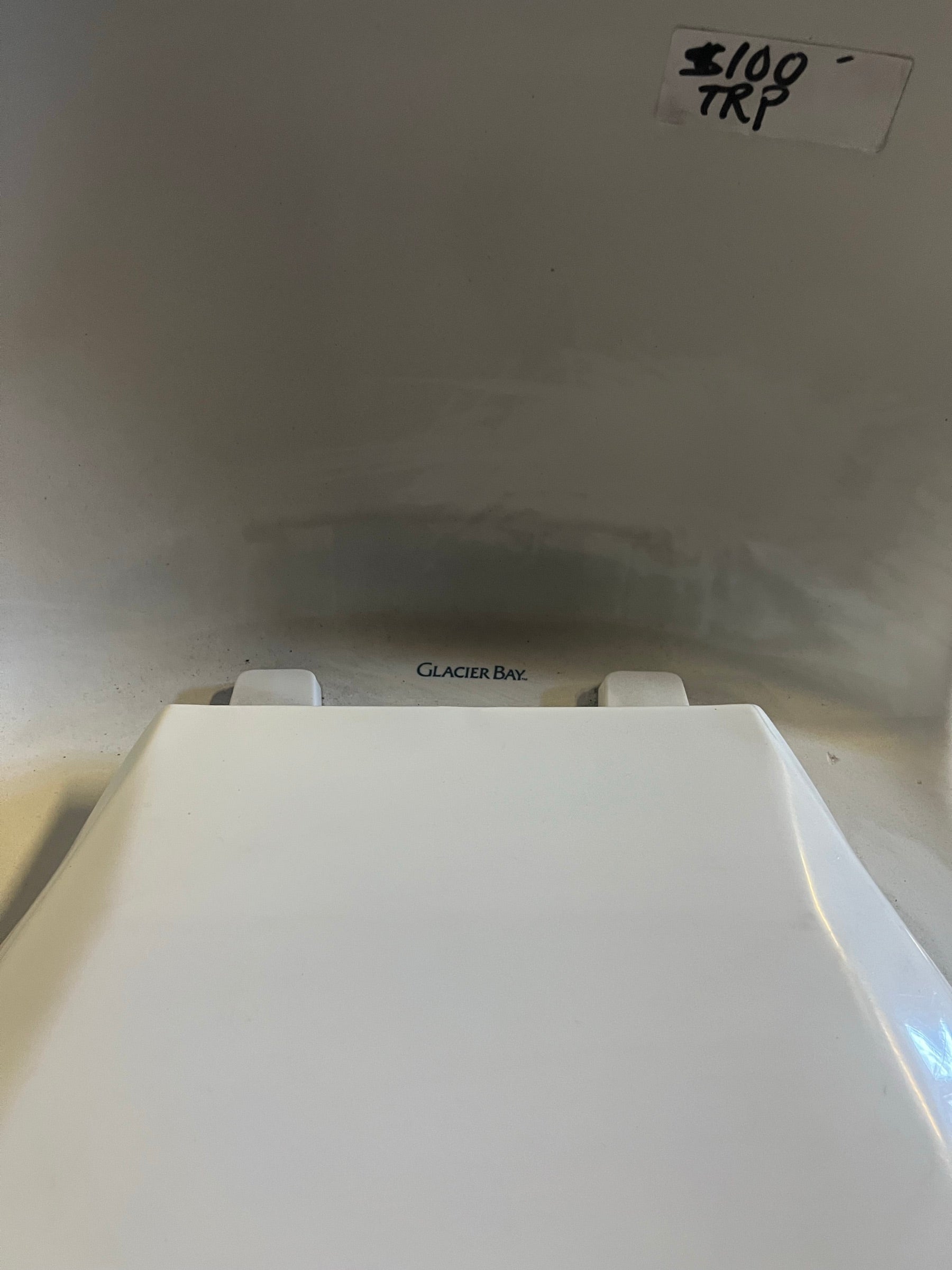 Glacier Bay brand mark on toilet, TRP | The ReUse People Oakland