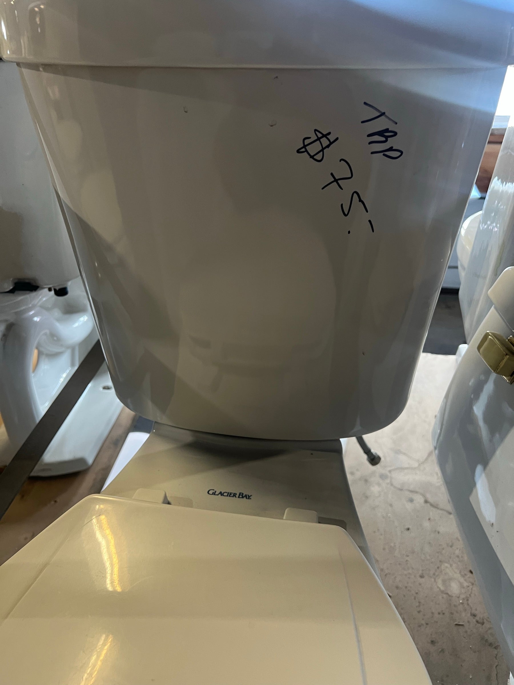 Glacier Bay brand mark on toilet, TRP | The ReUse People Oakland