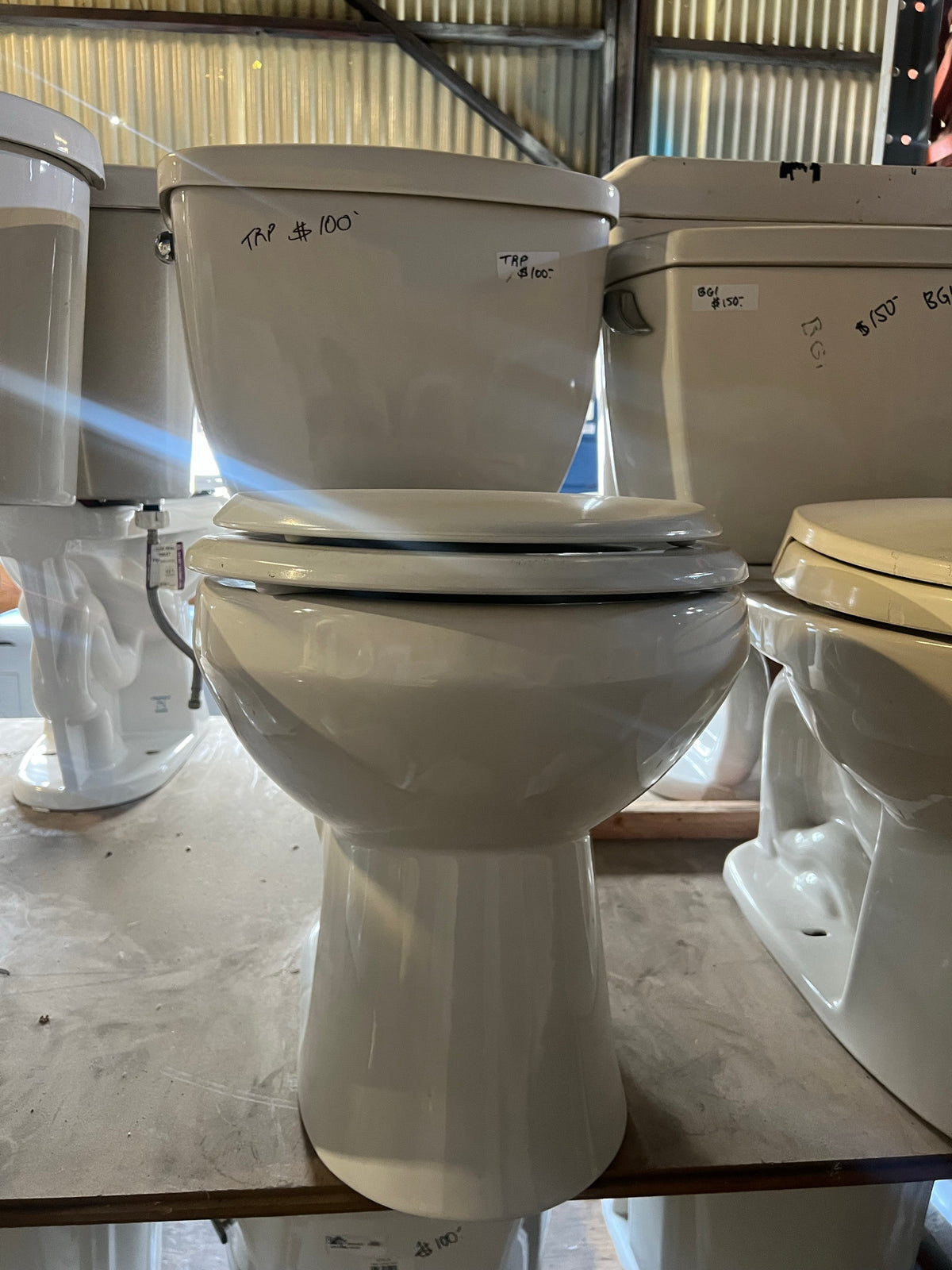 White Jacuzzi two-piece toilet, TRP | The ReUse People Oakland