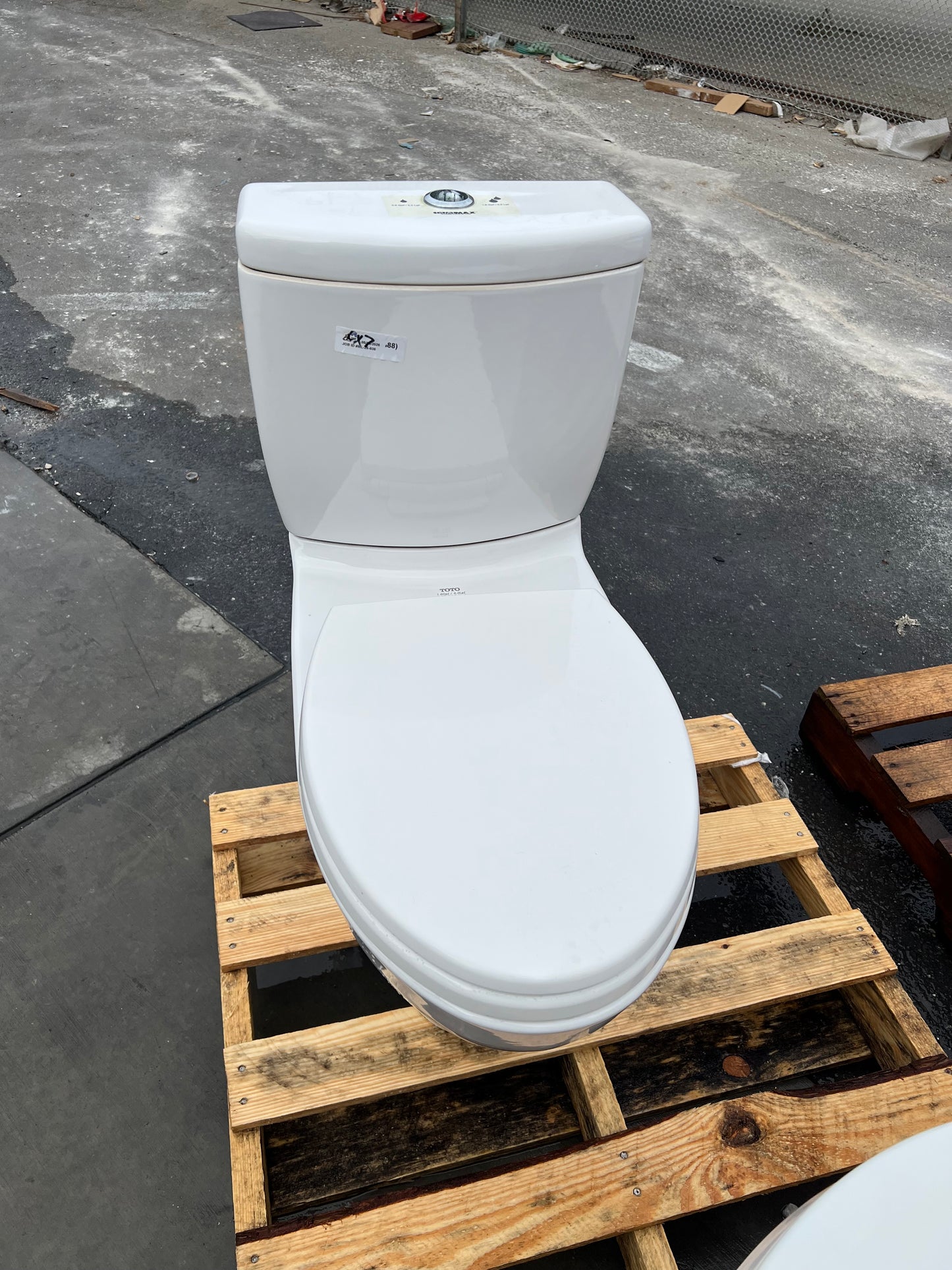 White two-piece Toto toilet, CX7 | The ReUse People Oakland